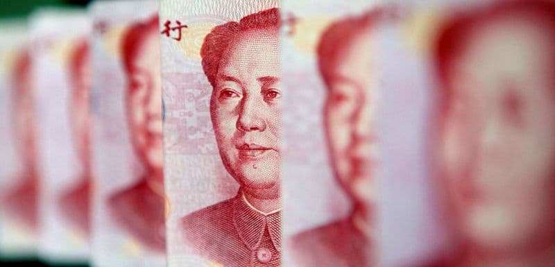 Курс юаня к доллару снизился на фоне осторожности инвесторов От Prime.RU